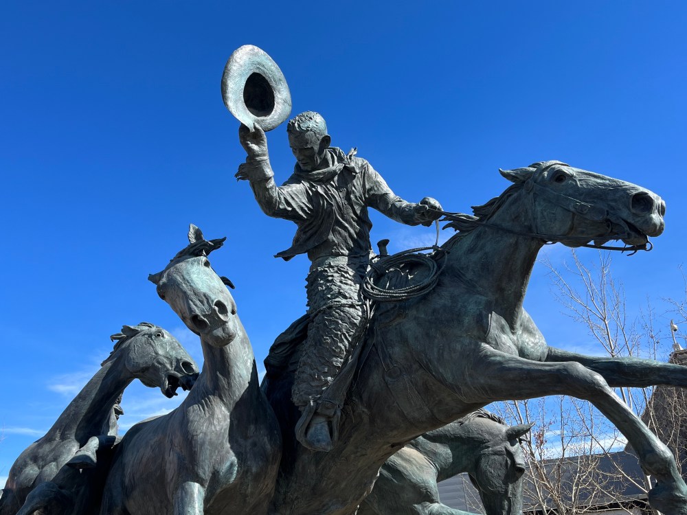 Cowboy and horses, By the Banks of the Bow public art installation in Stampede Park 